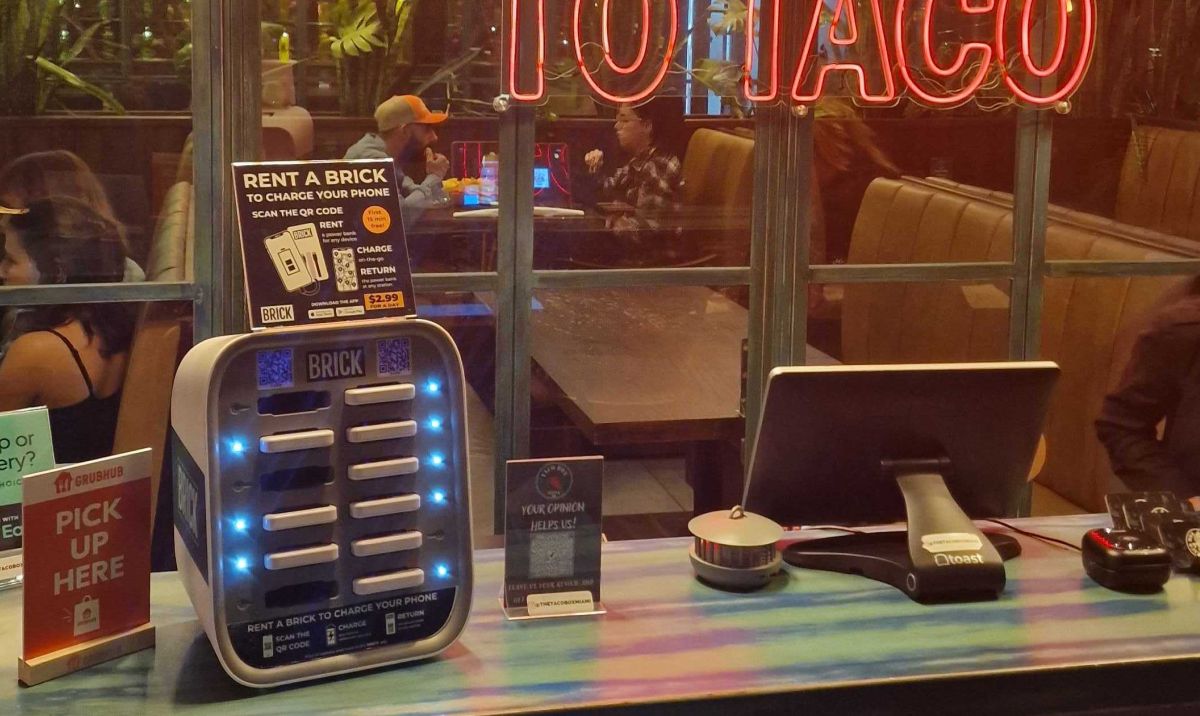 A Brick powerbank sharing station on a desk